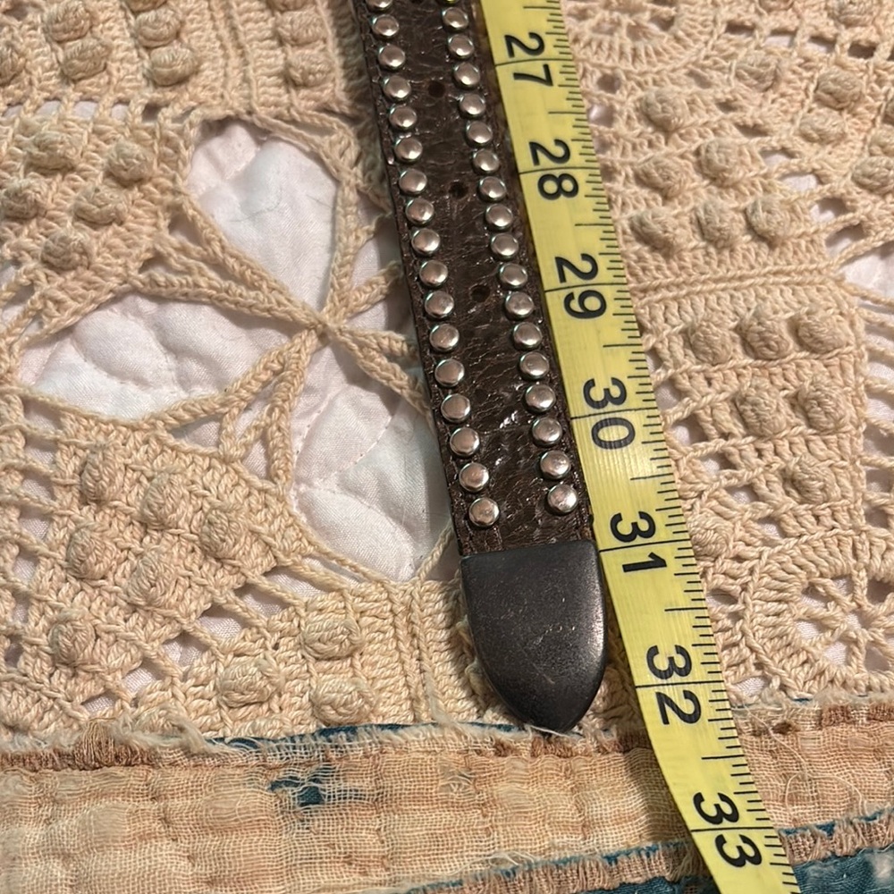 Belt with silver tone studs